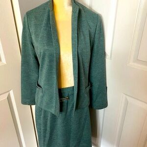 Vintage Henry Lee skirt suit right out of Mad Men.  Comes with matching belt.
